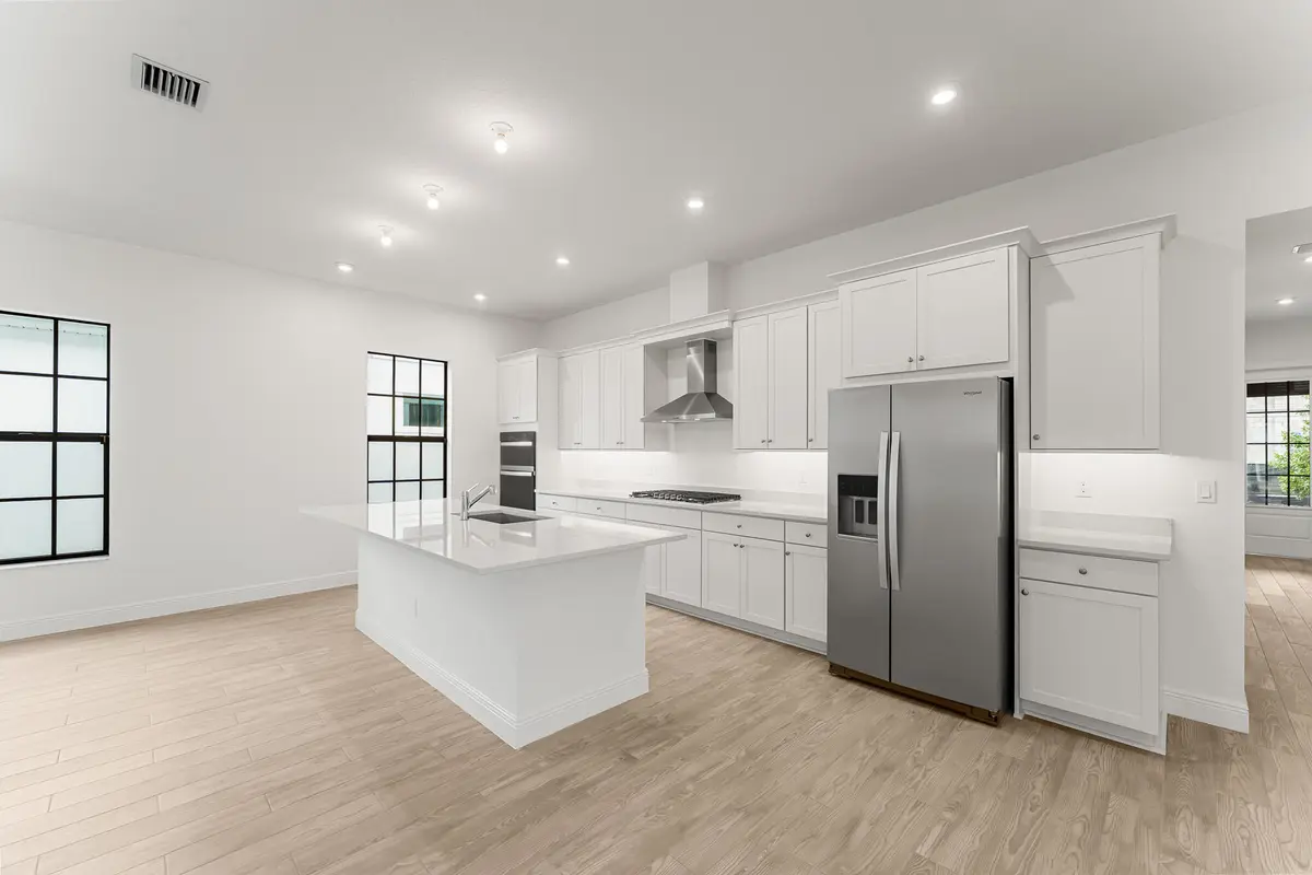 US_SEF_LIVINGSTONE_LOT 207_KITCHEN 2 at 701 SW Backus Lane, Palm City