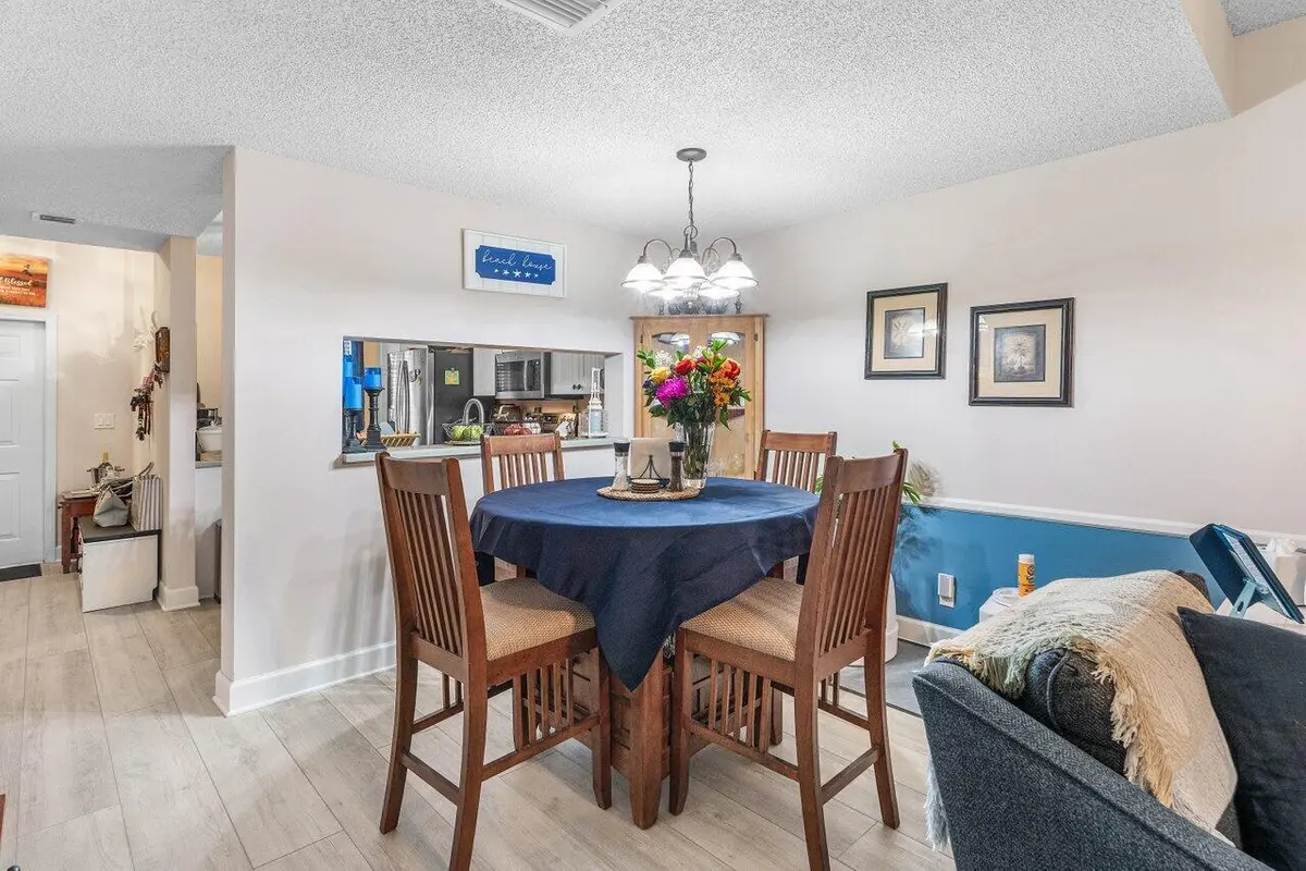Dining towards kitchen at 1022 Kokomo Key Lane, Delray Beach