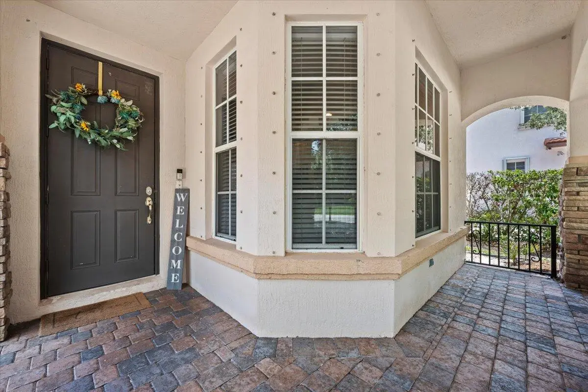 Inviting Porch Entry at 603 Castle Drive, Palm Beach Gardens