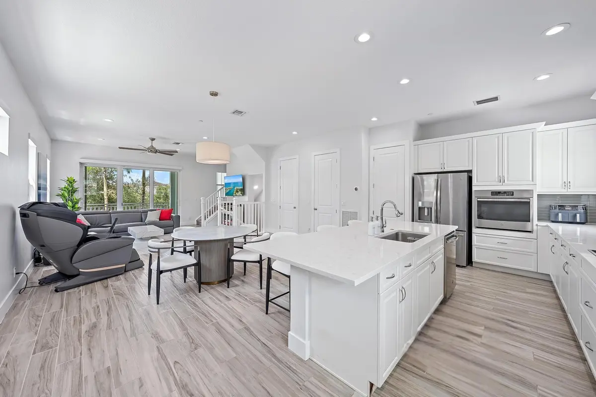 Living - Dining - Kitchen at 4145 Faraday Way, Palm Beach Gardens