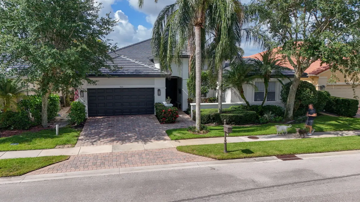 63-web-or-mls-DJI_20260616221218_0511_D- at 144 Sedona Way, Palm Beach Gardens