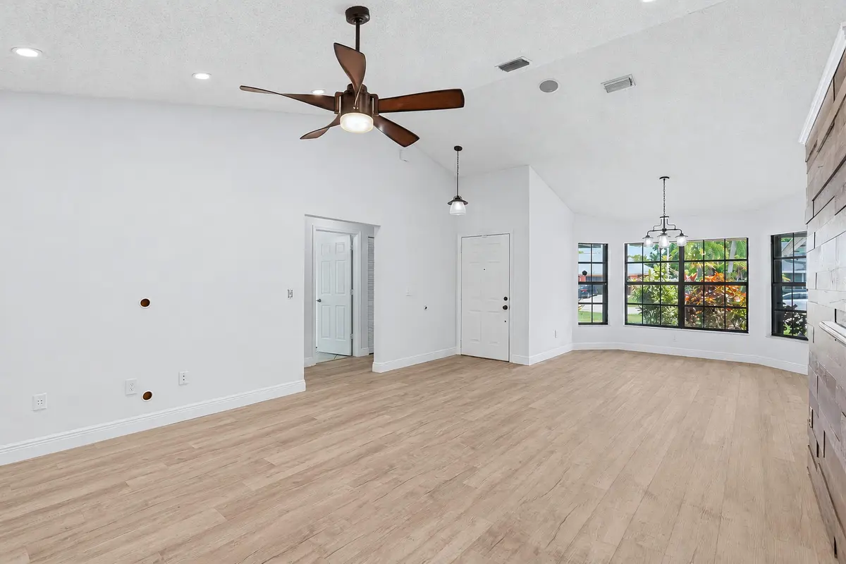 Living Room + Dining Area at 117 Sherwood Drive, Royal Palm Beach
