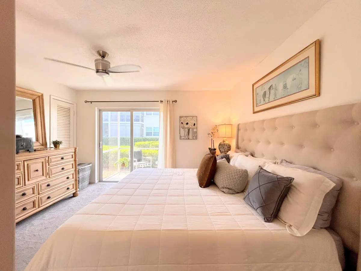 KING BED IN BEDROOM at 320 Horizons W 103, Boynton Beach