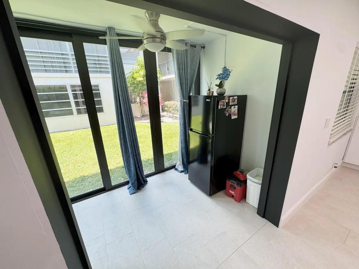 porch & extra fridge at 18 Piedmont A, Delray Beach