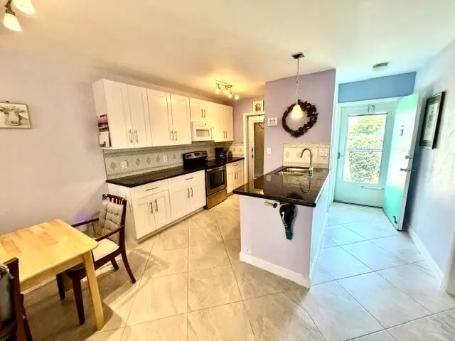 Two entries at 1116 Lake Terrace 114, Boynton Beach