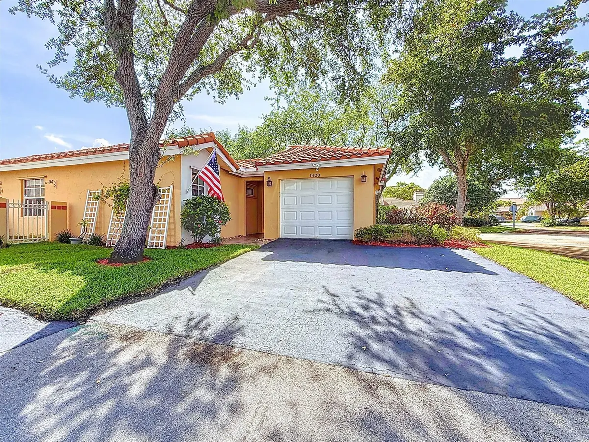 Photo 1 at 1420 Seagrape Circle, Weston