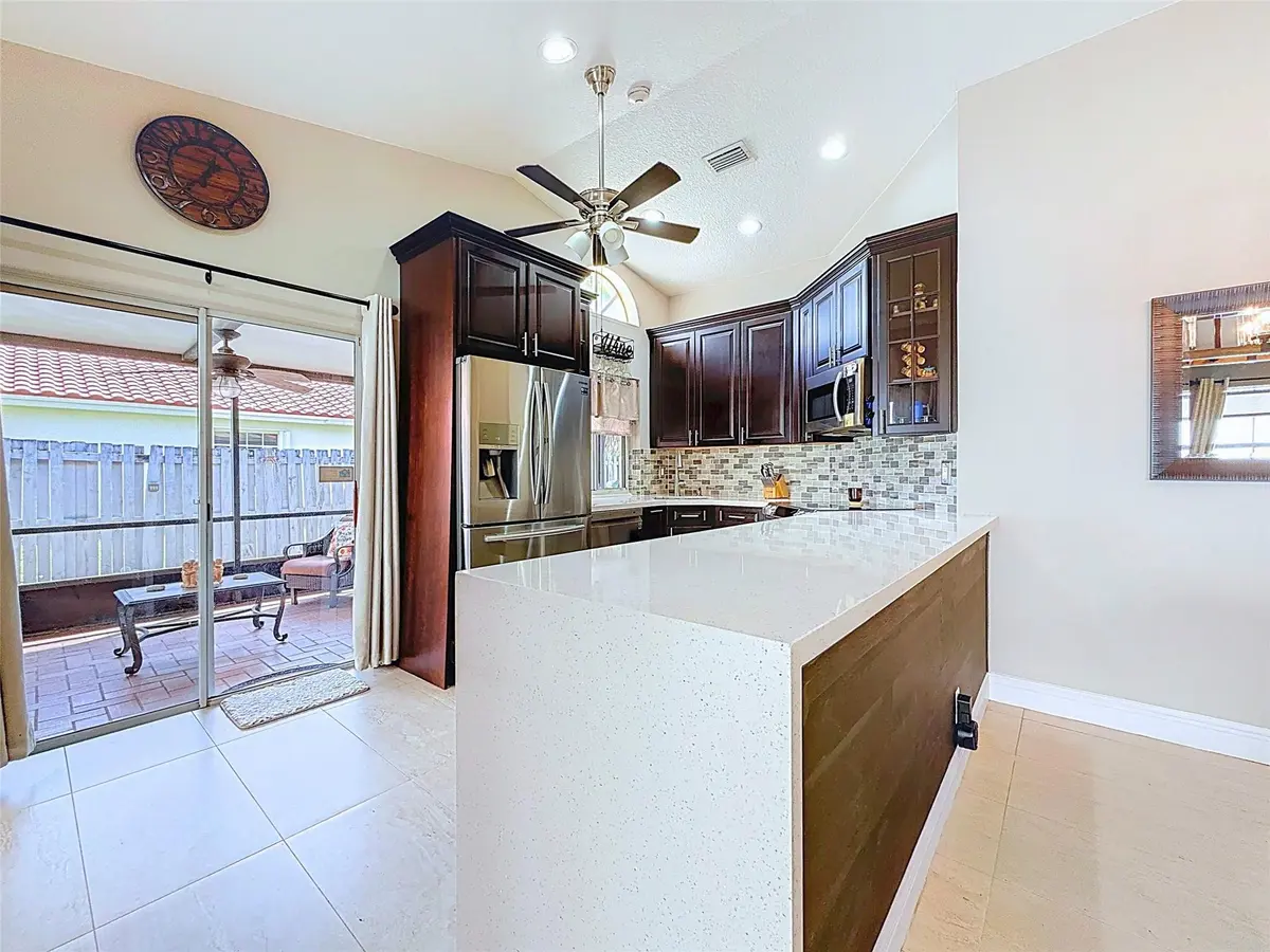Photo 7 at 1420 Seagrape Circle, Weston