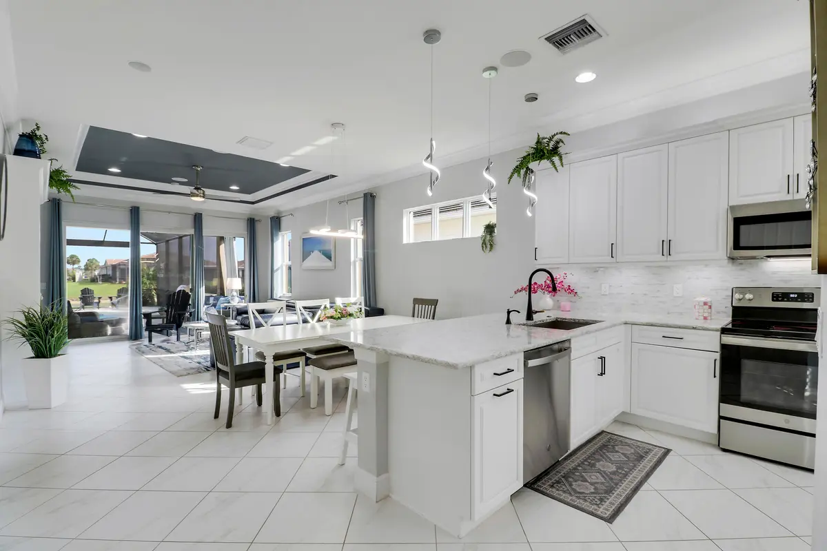 Kitchen & Great Room at 25020 SW Alberti Way, Port St. Lucie