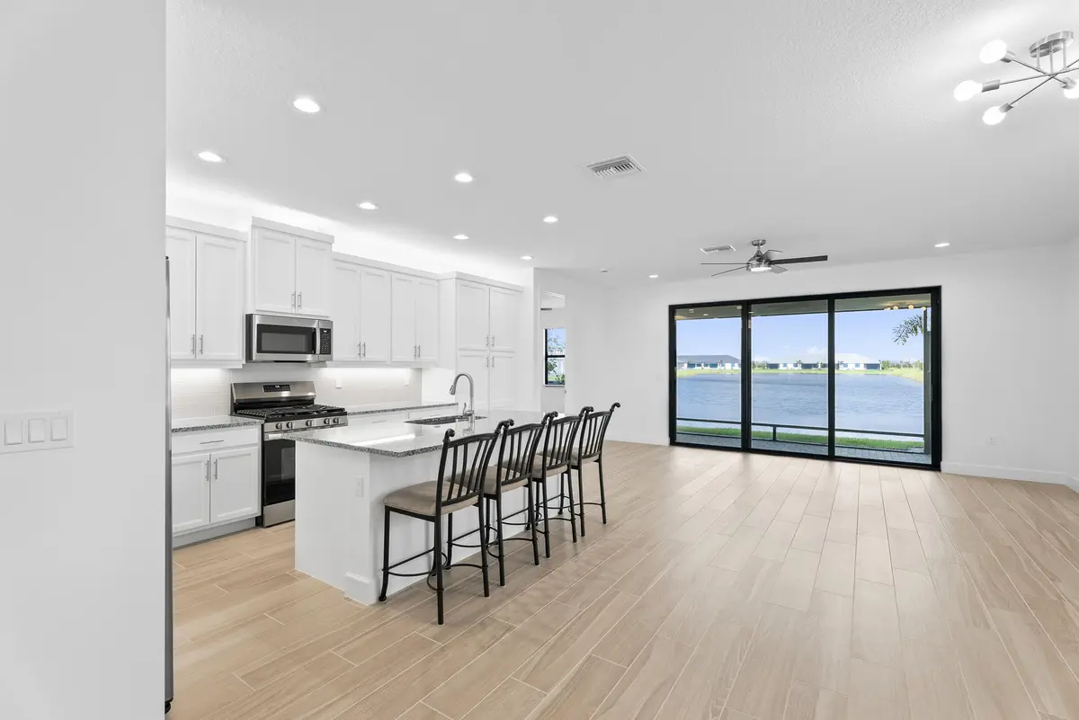 Kitchen- Living at 12578 SW Dream River Road, Port St. Lucie