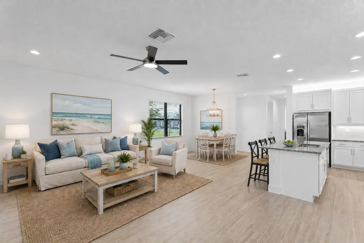 Living- Dining Virtually Staged at 12578 SW Dream River Road, Port St. Lucie