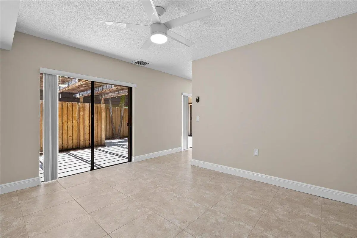 Den w/sliders to Lanai at 2108 21st Lane, Palm Beach Gardens