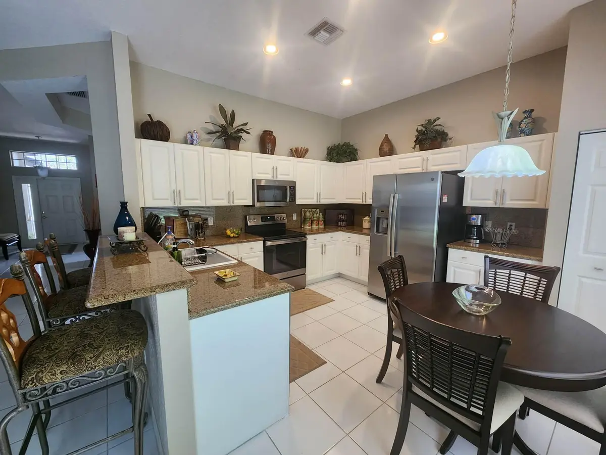 att.MIotfGR03L5hSlYCDyYsEYFlnlCKhHNtVQpw at 7940 Rockford Road, Boynton Beach