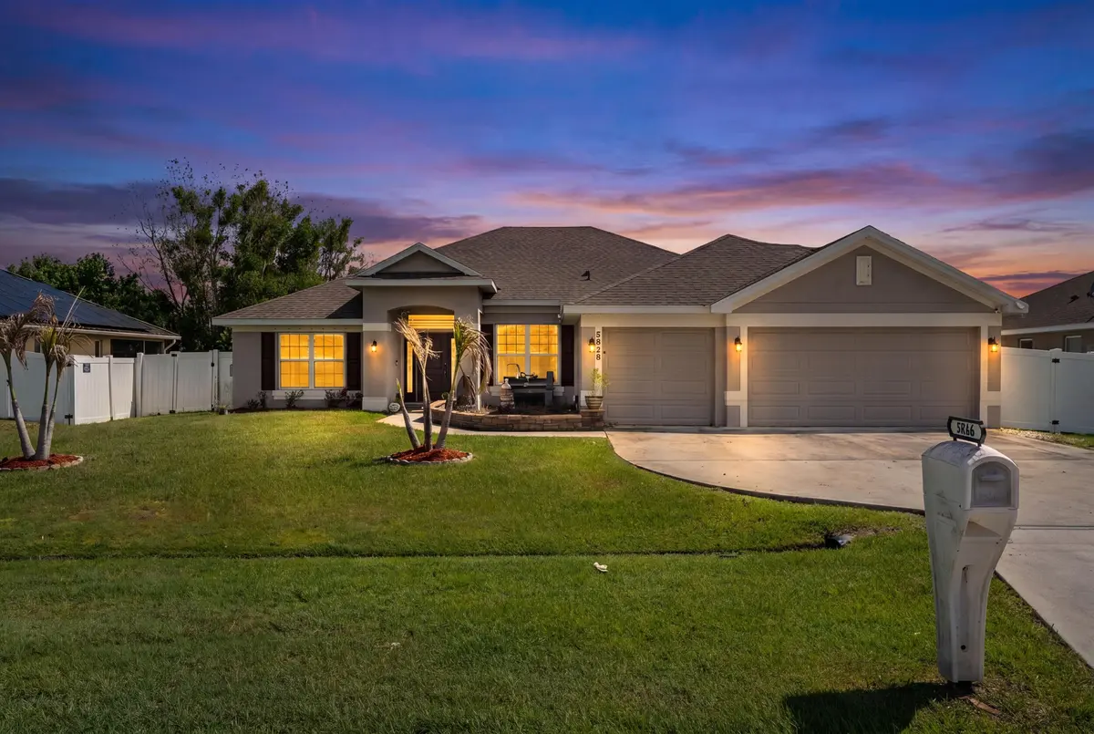 Front exterior twilight at 5846 NW Dooley Circle, Port St. Lucie