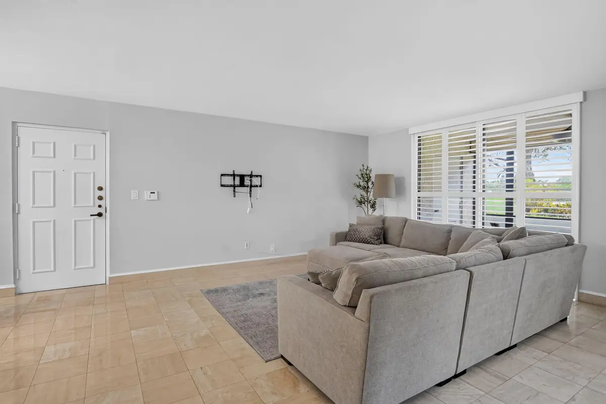 Entry and living area at 7225 Promenade Drive 102, Boca Raton