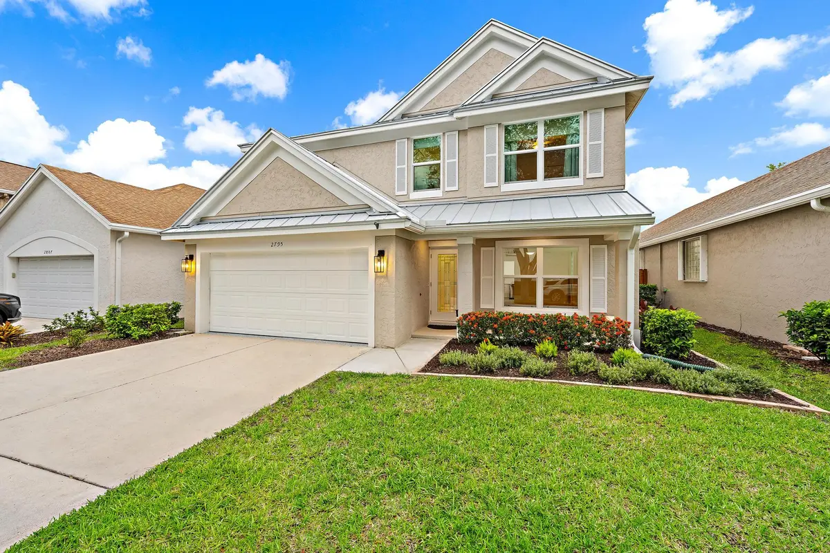 YOUR NEW HOME AWAITS YOU IN PALM CITY! at 2795 SW Mill Creek Way, Palm City