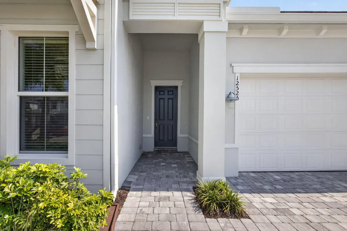 Covered Portico Entrance at 12525 Triumph Lane, Palm Beach Gardens