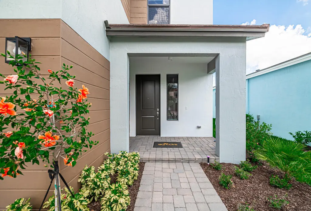 Paver walkway, covered front porch at 16469 Sea Turtle Place, Westlake