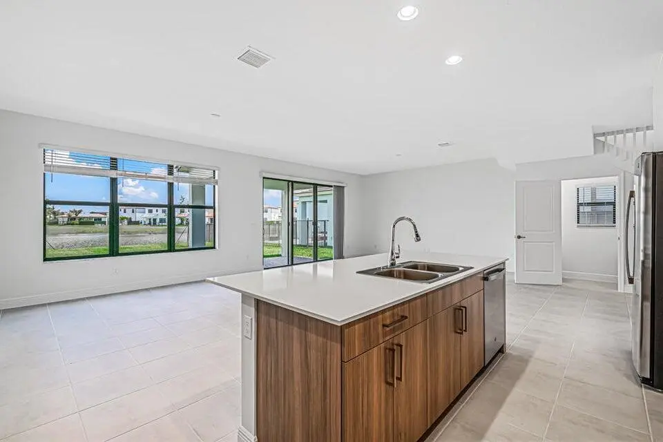 Quartz island overlooks living area at 16469 Sea Turtle Place, Westlake
