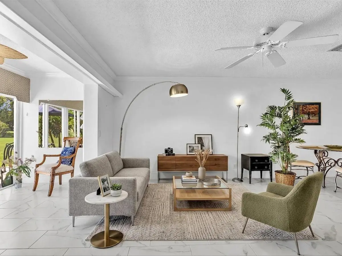 Staged Living Room at 2017 SW GOLF Lane 109, Boynton Beach