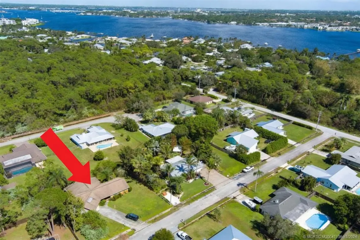 MIKES HOUSE WITH ARROW at 1321 SW Nikoma Street, Palm City