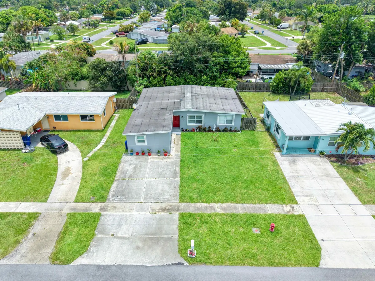 Drone Front at 754 Hibiscus Drive, Royal Palm Beach