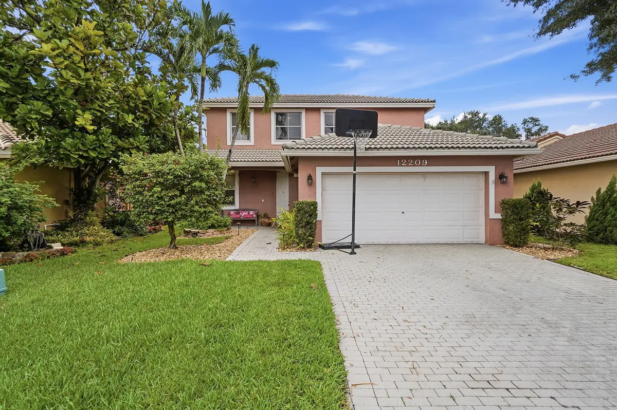 01_front at 12209 NW 57th Street, Coral Springs