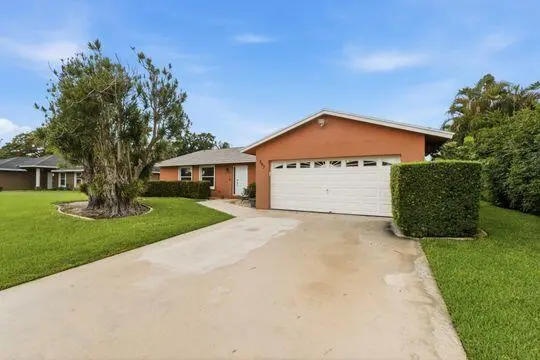 Exterior at 397 La Mancha Avenue, Royal Palm Beach