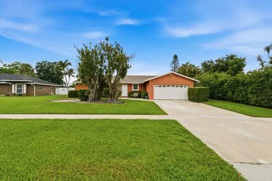 Front View at 397 La Mancha Avenue, Royal Palm Beach