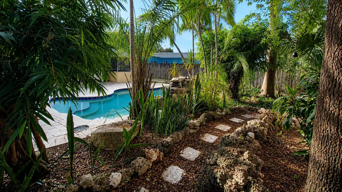 1497 Pool back walkway at 1497 SW 29th Terrace, Fort Lauderdale