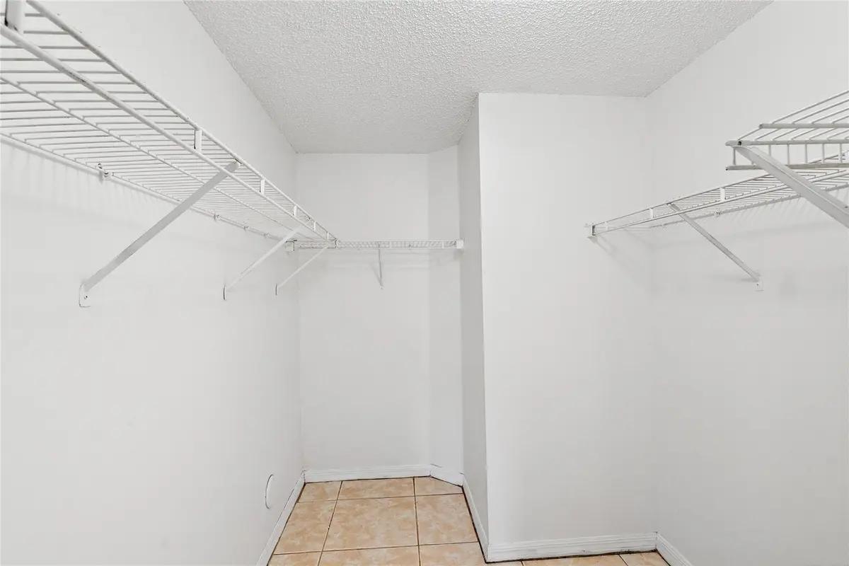 Master Bedroom walk in closet at 2173 NW 78th Avenue, Pembroke Pines