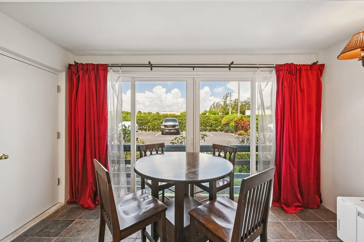 Dining nook with garden view at 11000 S Ocean Drive 2-6, Jensen Beach