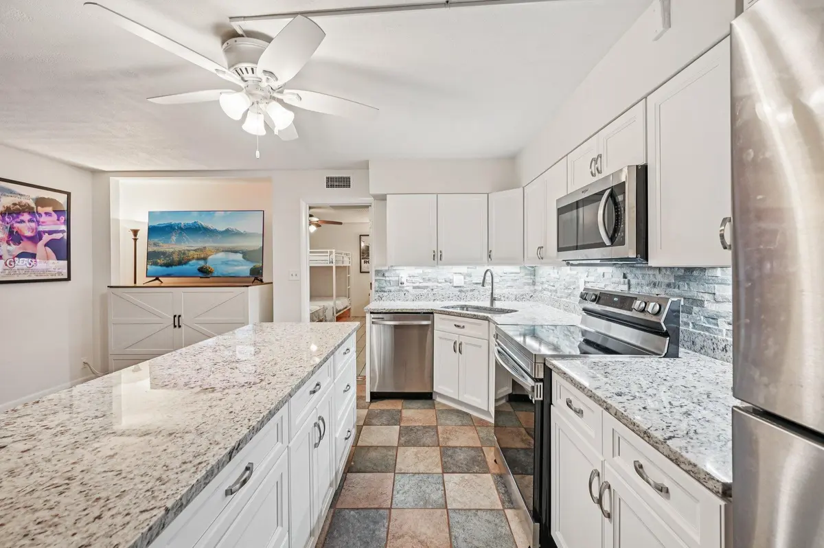 Bright galley kitchen with comfy layout at 11000 S Ocean Drive 2-6, Jensen Beach