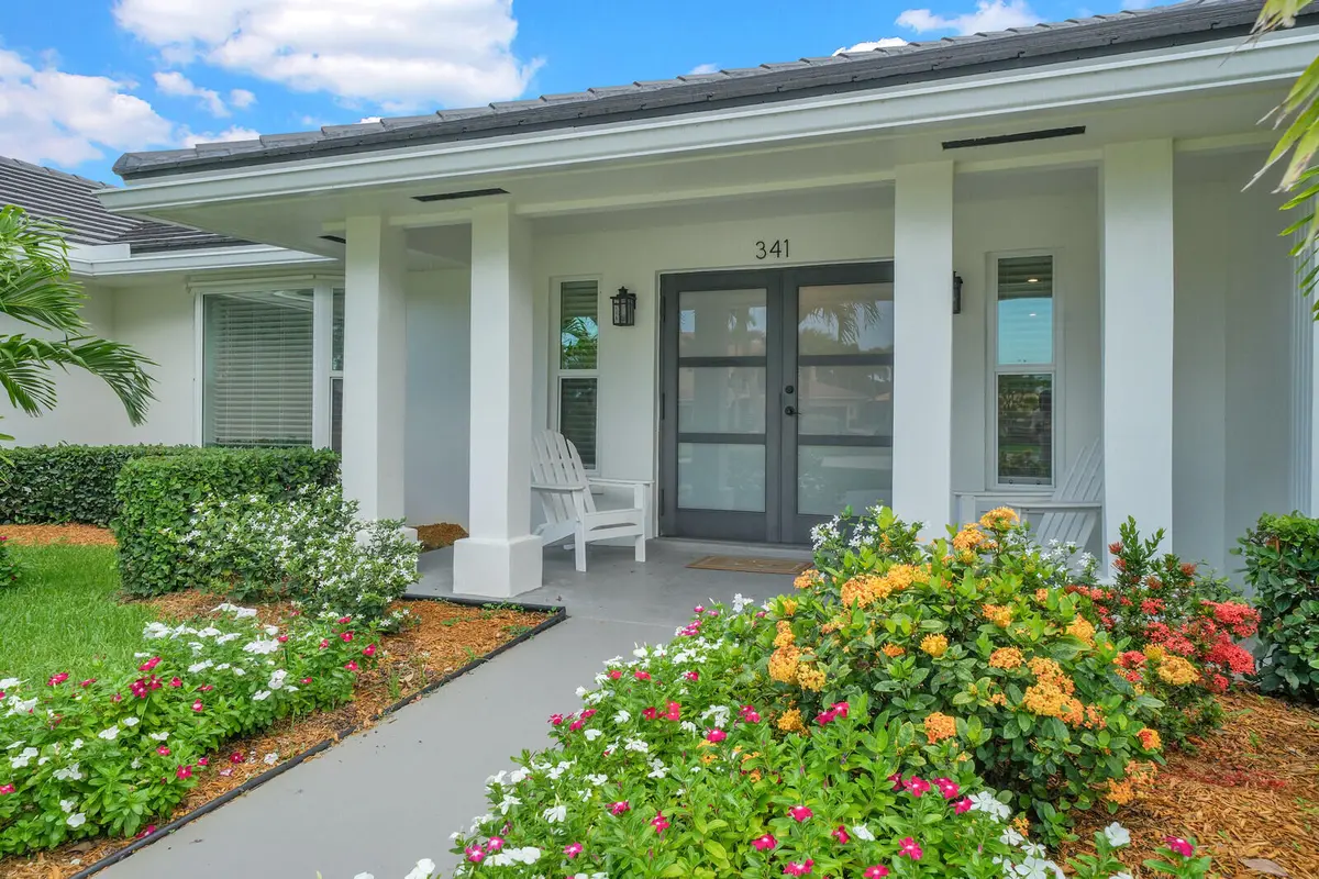 Adorable covered, front patio at 341 Glenbrook Drive, Atlantis