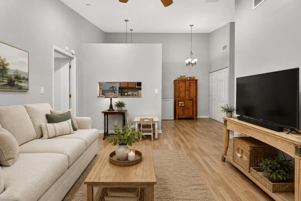 LIVING ROOM VIRTUALLY STAGED at 6258 Chasewood Drive G, Jupiter