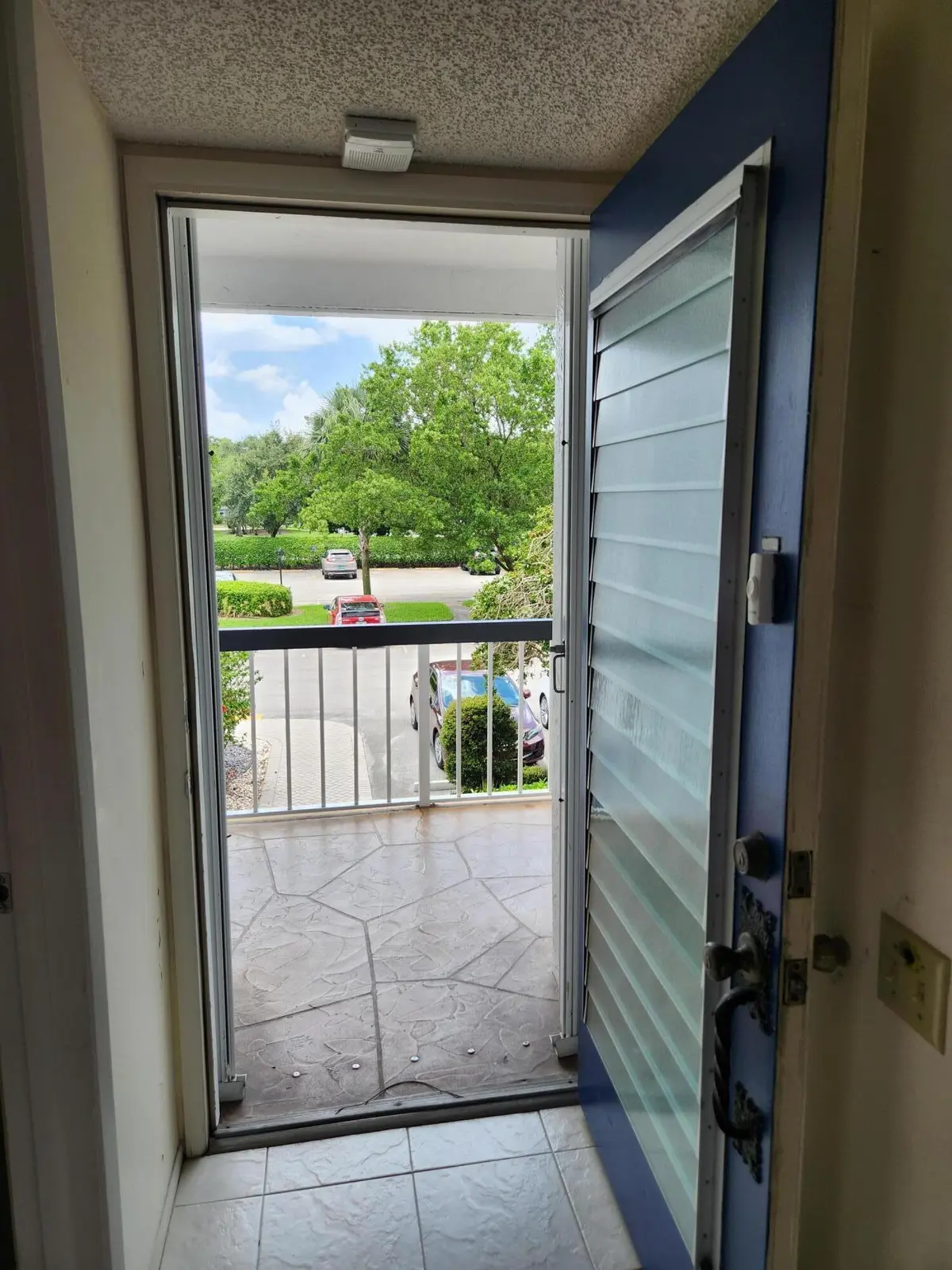 Open Front Door View at 4501 Martinique Way C2, Coconut Creek