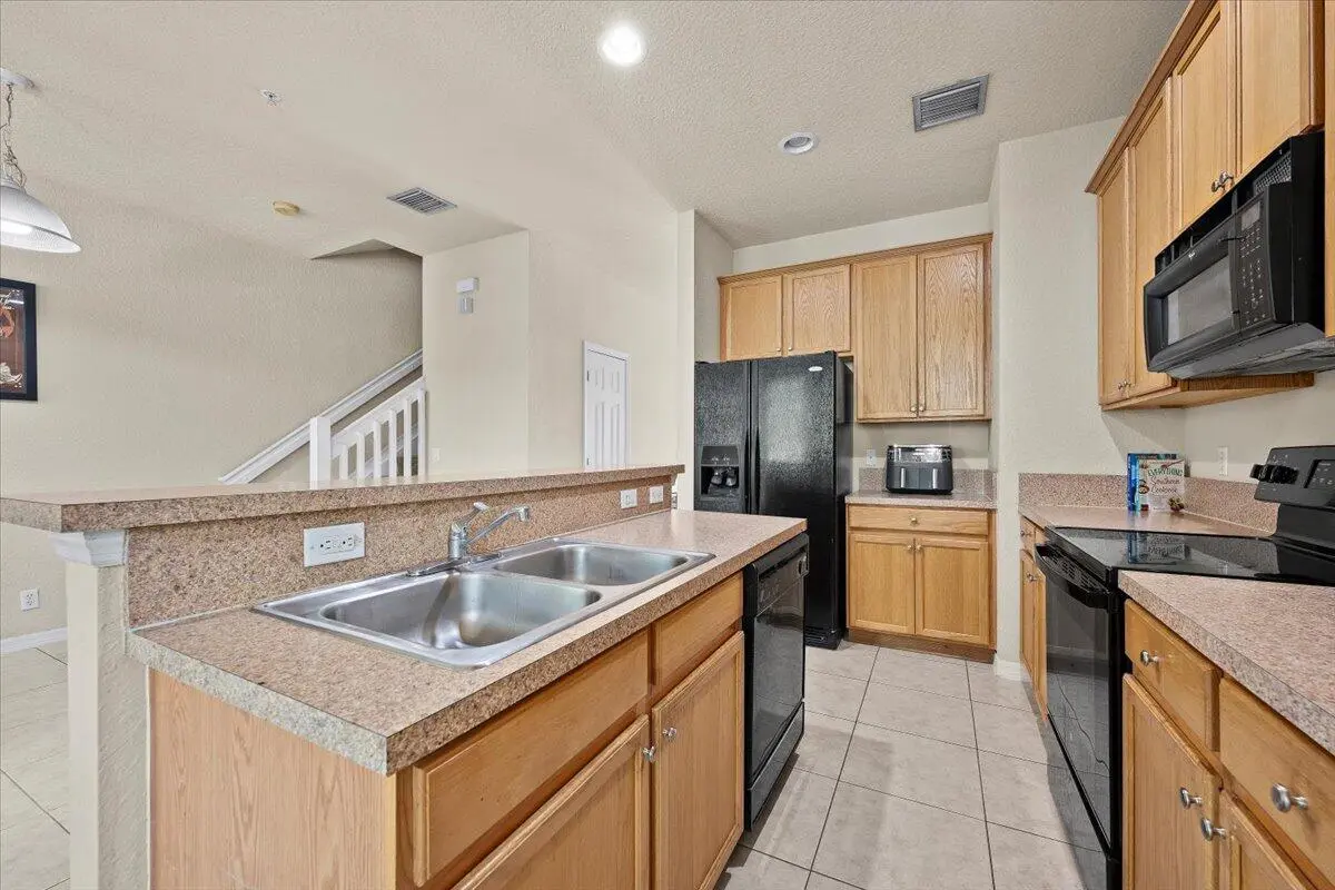Kitchen at 335 E Thatch Palm Circle 104, Jupiter
