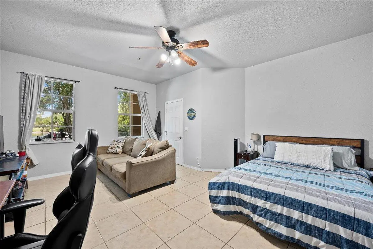 Downstairs Bedroom at 335 E Thatch Palm Circle 104, Jupiter