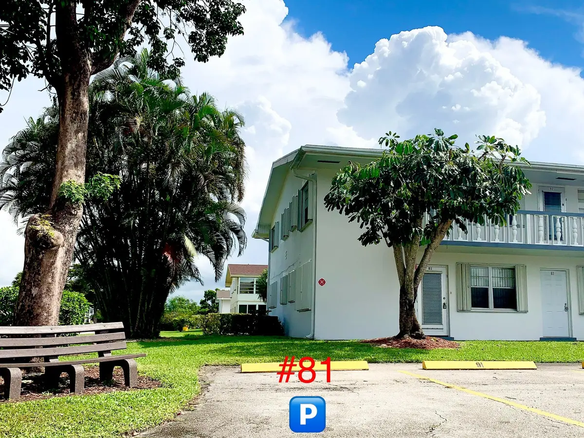 Door Step Parking at 81 Kingswood E, West Palm Beach