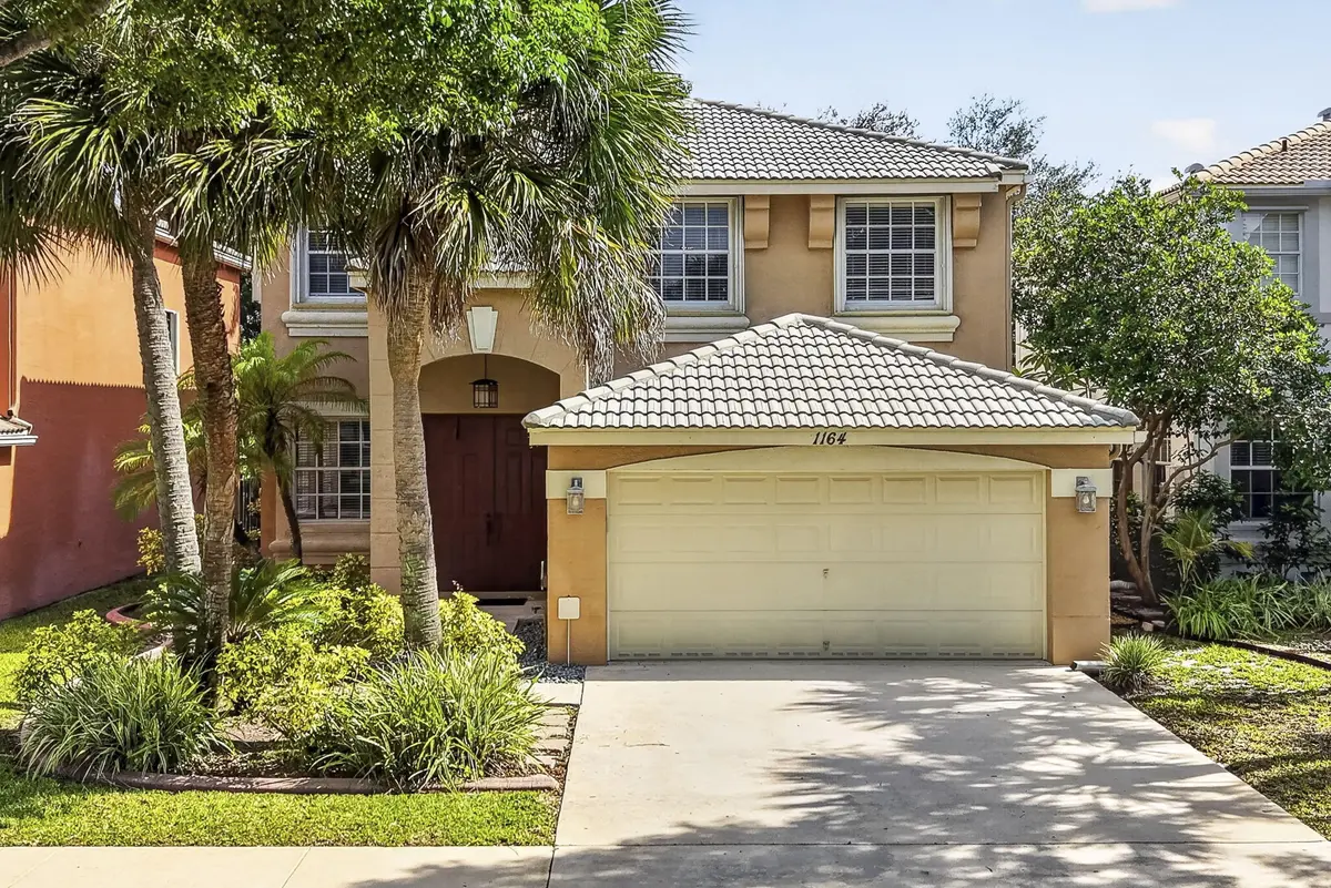 1-web-or-mls-DJI_20260701100528_0962_D at 1164 Oakwater Drive, Royal Palm Beach