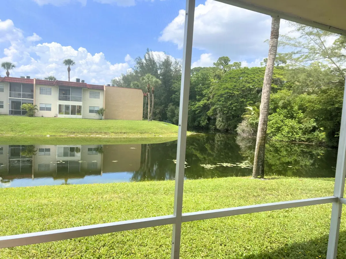 LOOKING OUT YOUR BACK at 463 Lake Frances Drive 463, West Palm Beach