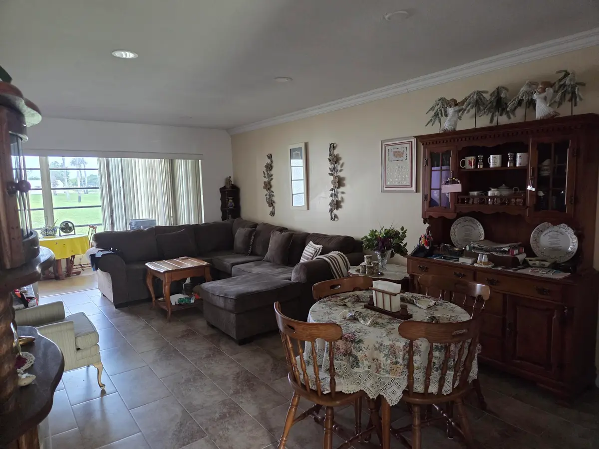 Dining-Living Room at 235 Lake Meryl Drive 235, West Palm Beach
