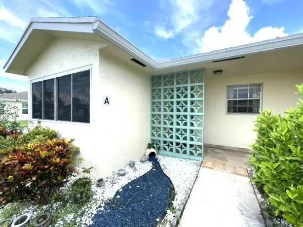 Entrance to corner villa at 5397 Lakefront Boulevard A, Delray Beach
