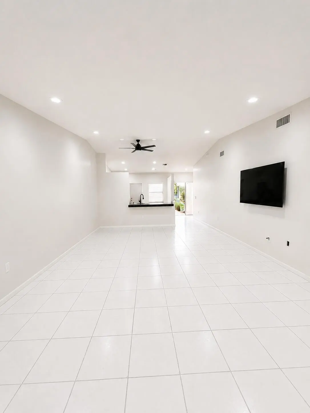 living room 2 softer white walls at 6356 Pointe Pleasant Circle, Delray Beach