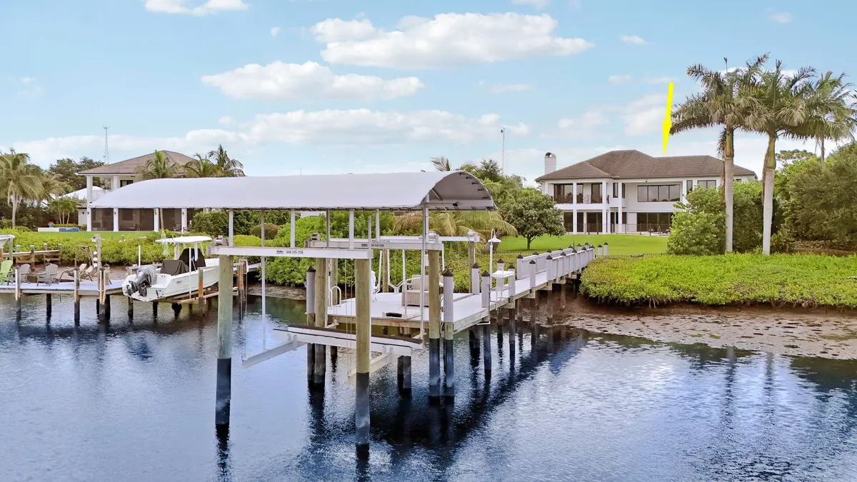 Dock View to home at 18411 SE Lakeside Drive, Jupiter