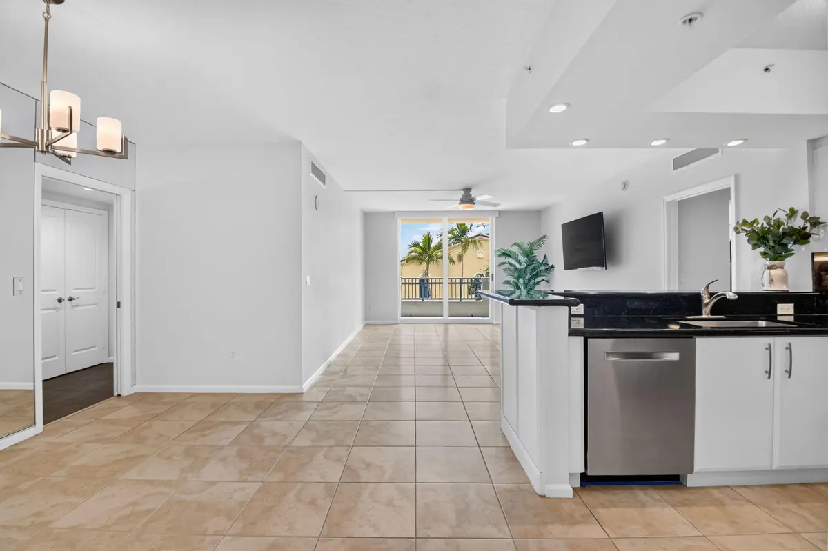 Open Kitchen to Living & Dining Areas at 403 S Sapodilla Avenue 307, West Palm Beach
