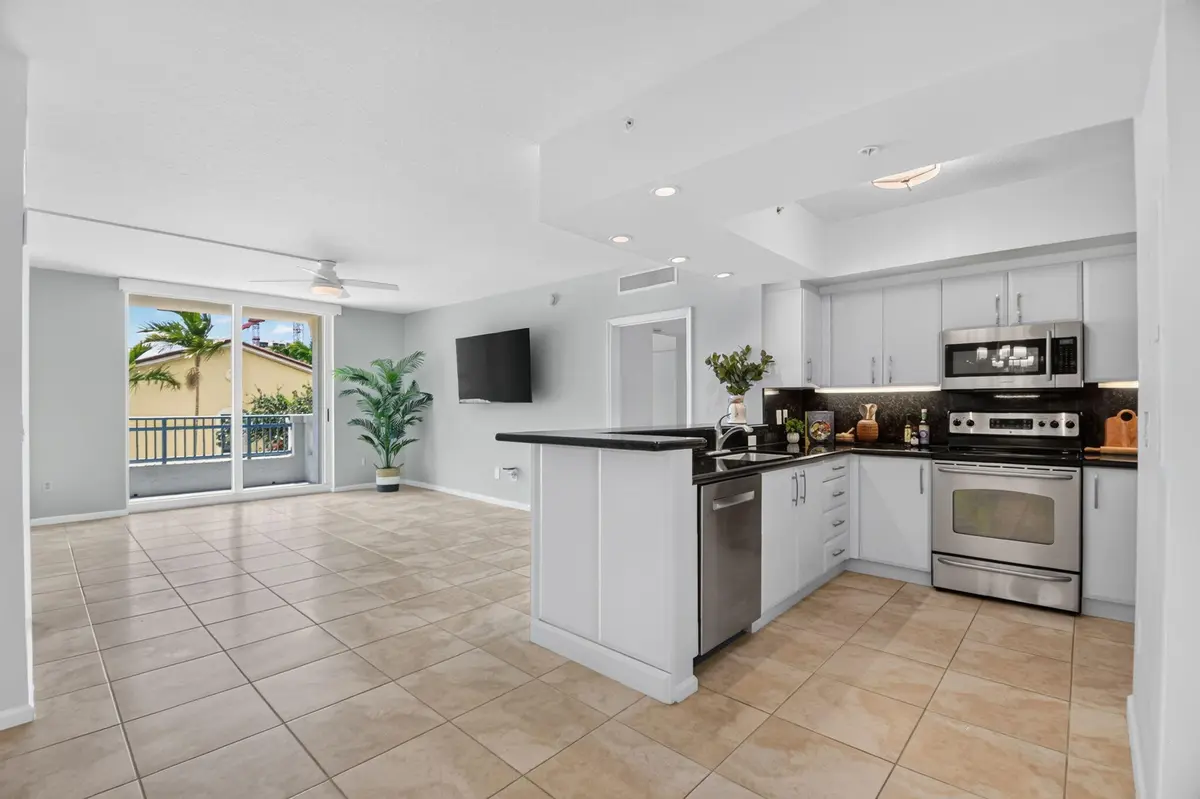 Updated Open Kitchen to Living Area at 403 S Sapodilla Avenue 307, West Palm Beach