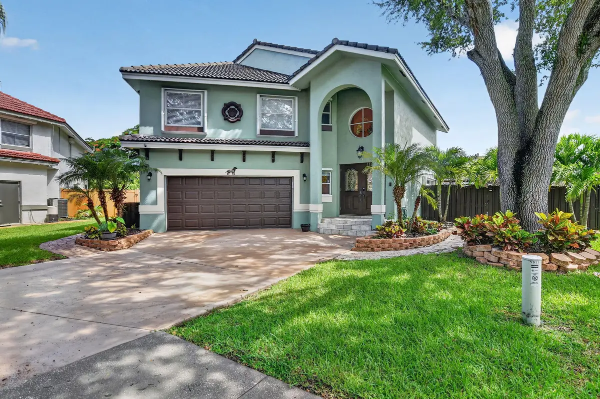 aged landscaping at 5901 NW 58th Terrace, Parkland