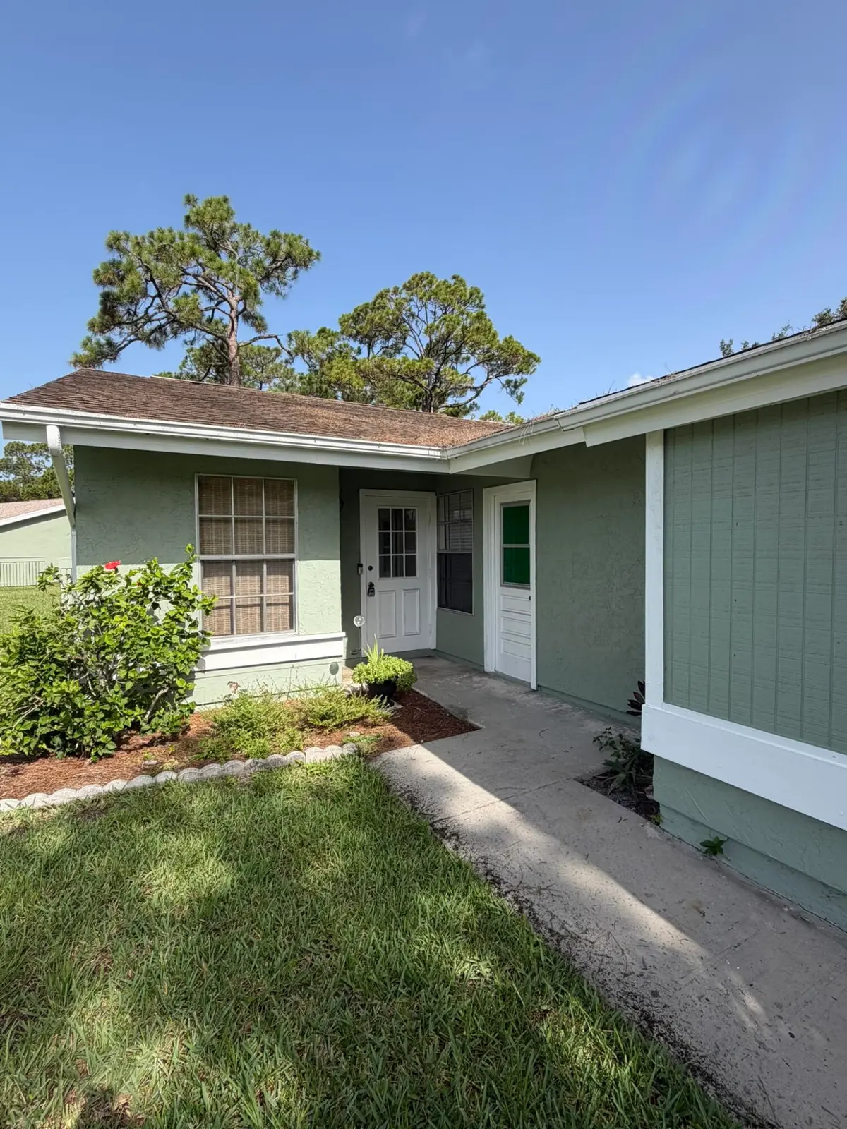 Exterior Front at 1720 SE Linpark Court, Port St. Lucie