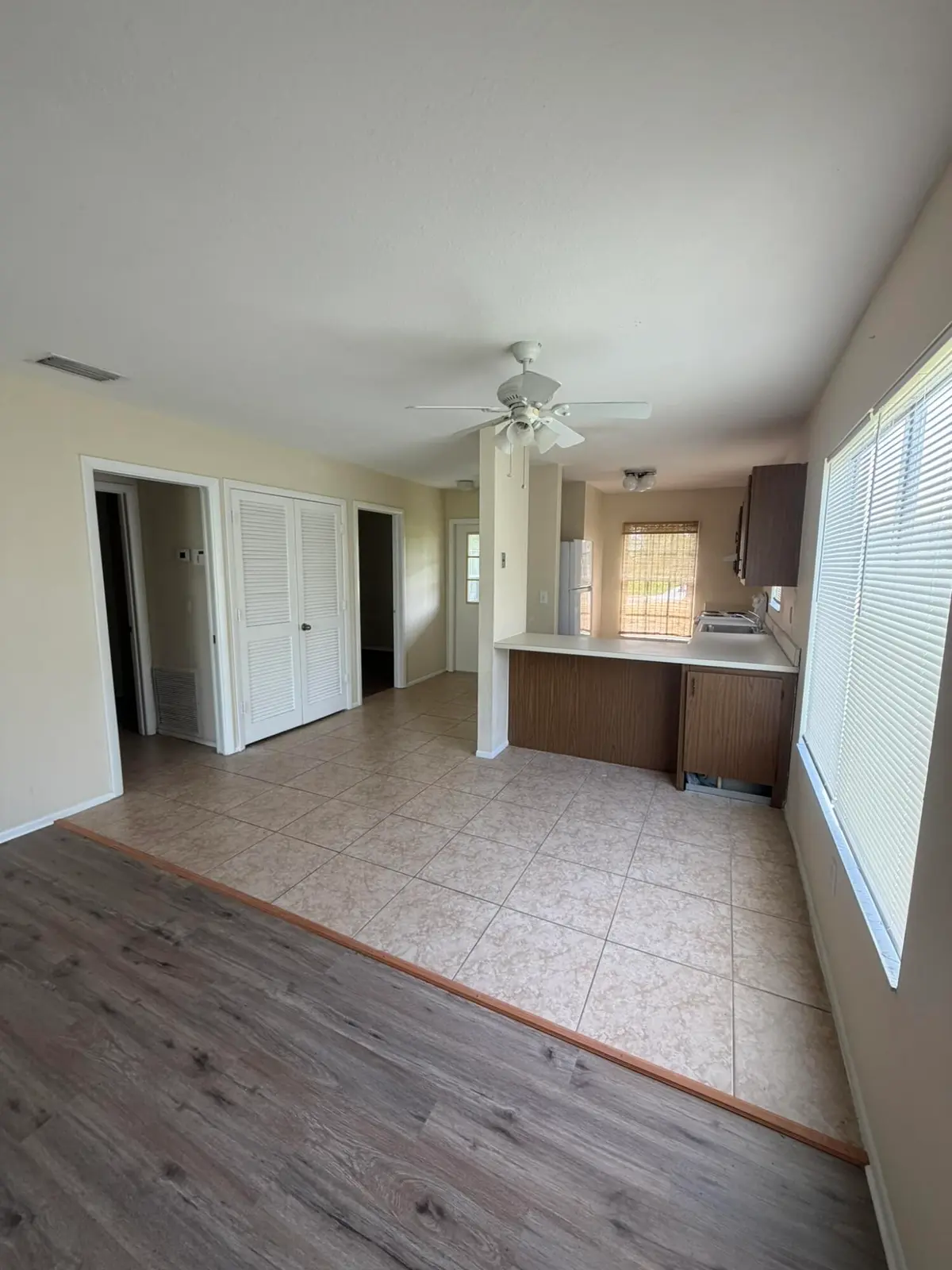 Dining to kitchen at 1720 SE Linpark Court, Port St. Lucie