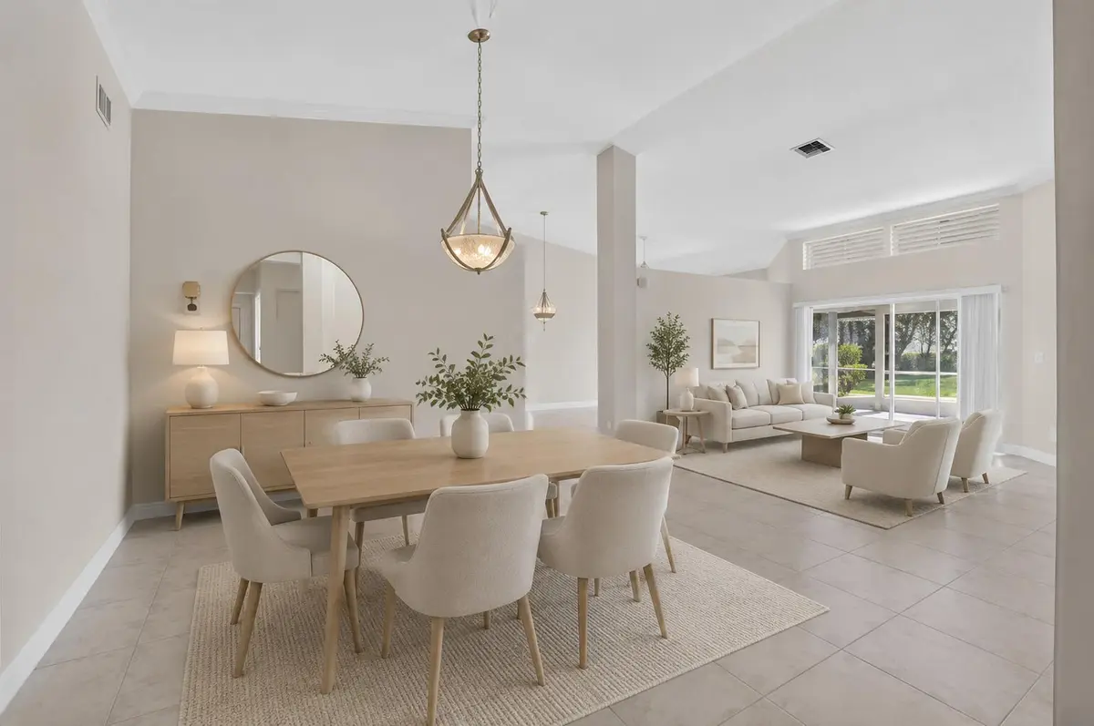 Living room dining room virtually staged at 9875 Harbour Lake Circle, Boynton Beach